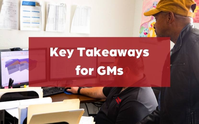 KT's for GMs general manager teaching his employee something on a computer