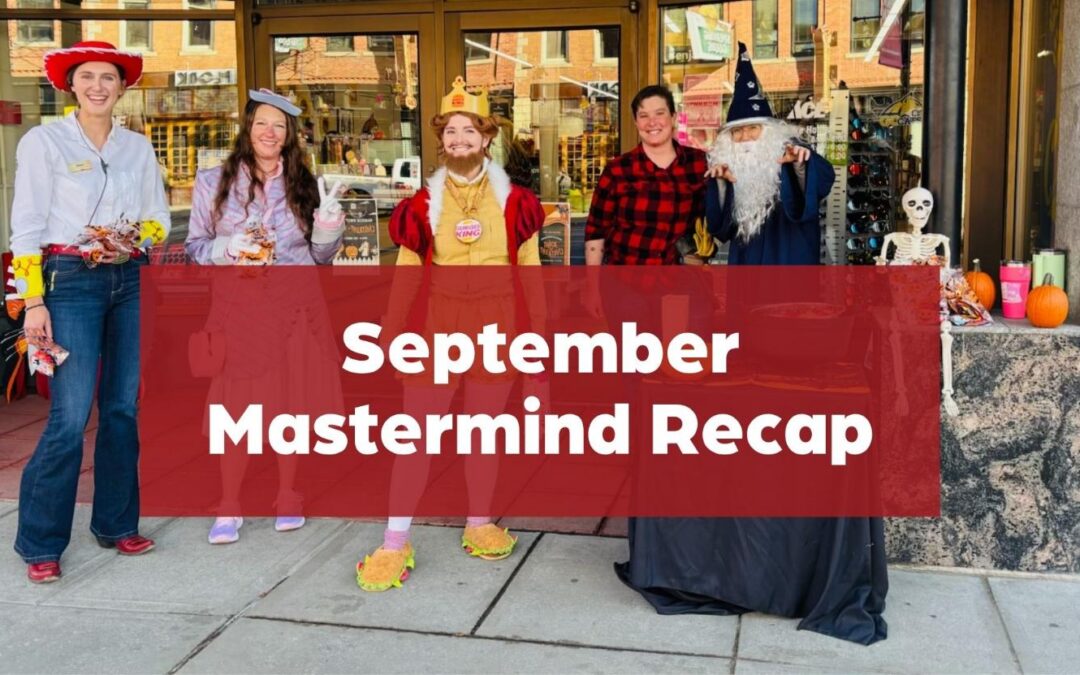 Five hardware store employees in costumes stand outside the store with text reading “September Mastermind Recap.”