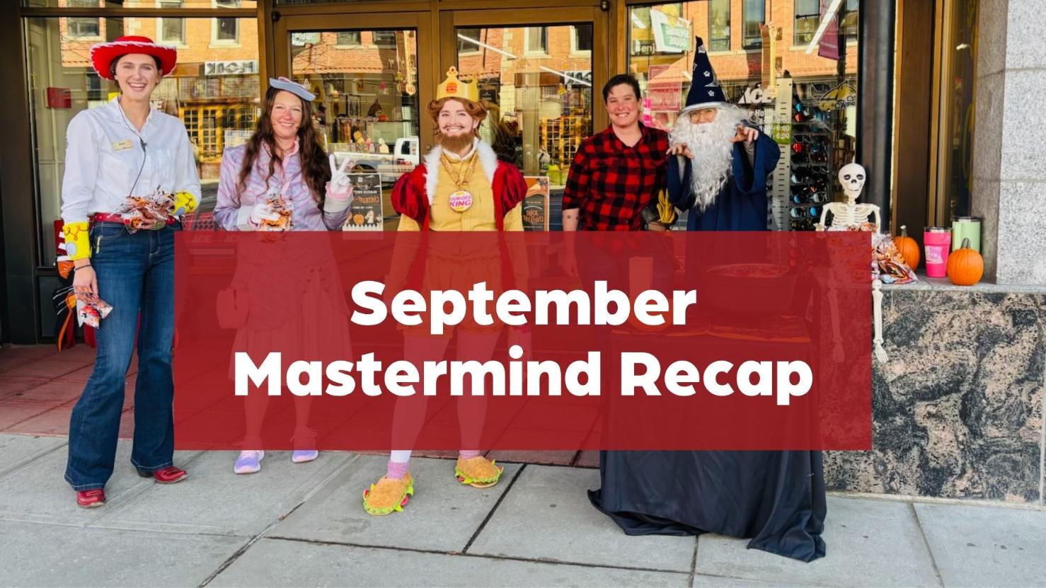 Five hardware store employees in costumes stand outside the store with text reading “September Mastermind Recap.”