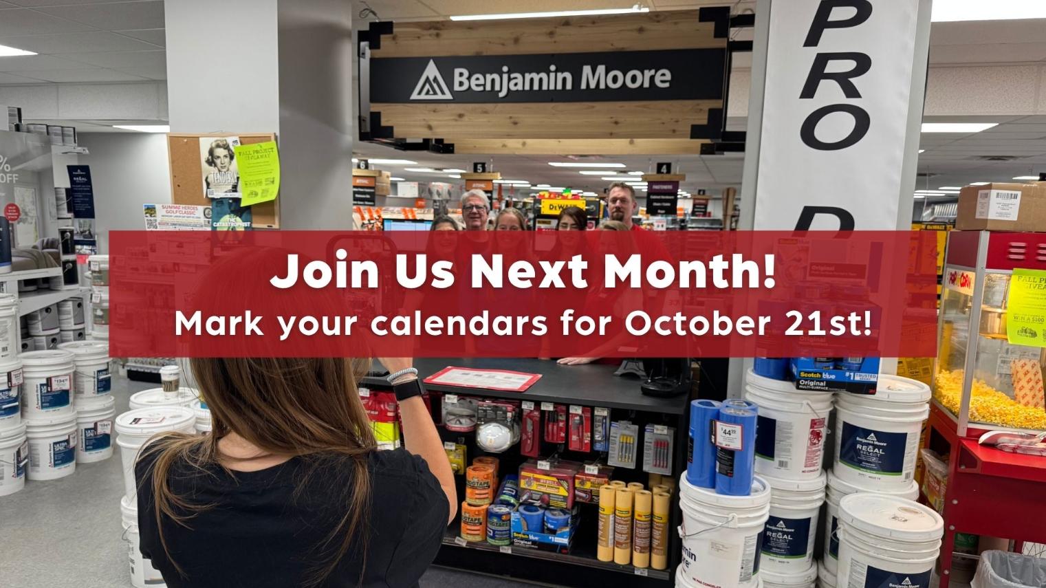 Hardware store employees gather behind the paint counter with text reading “Join Us Next Month! Mark your calendars for October 21st!